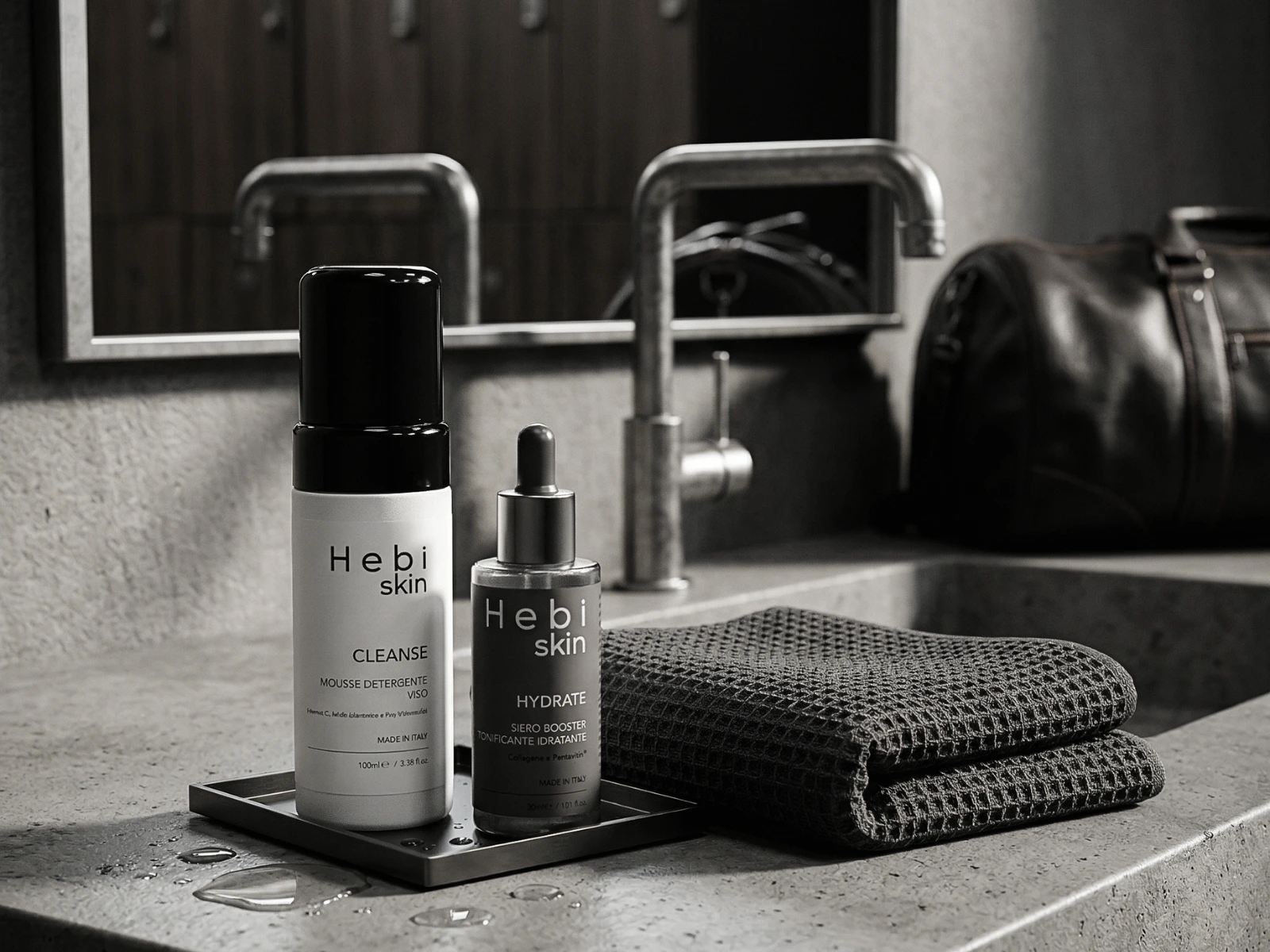 Lavabo in palestra con CLEANSE HYDRATE asciugamano e routine post doccia